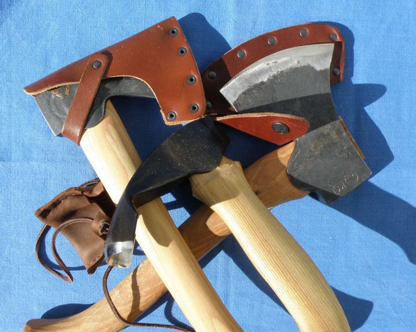 Two axes and an adze.