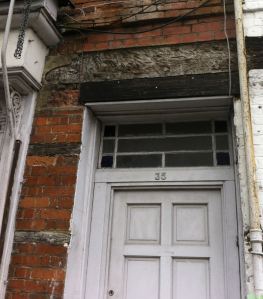 Oak lintel above the door of 35 High Street, Royal Wootton Bassett