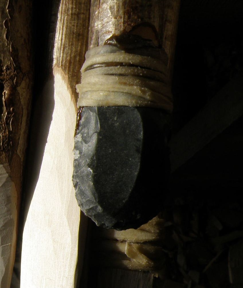 Also held with glue and finished with a rawhide strip, with works really well.