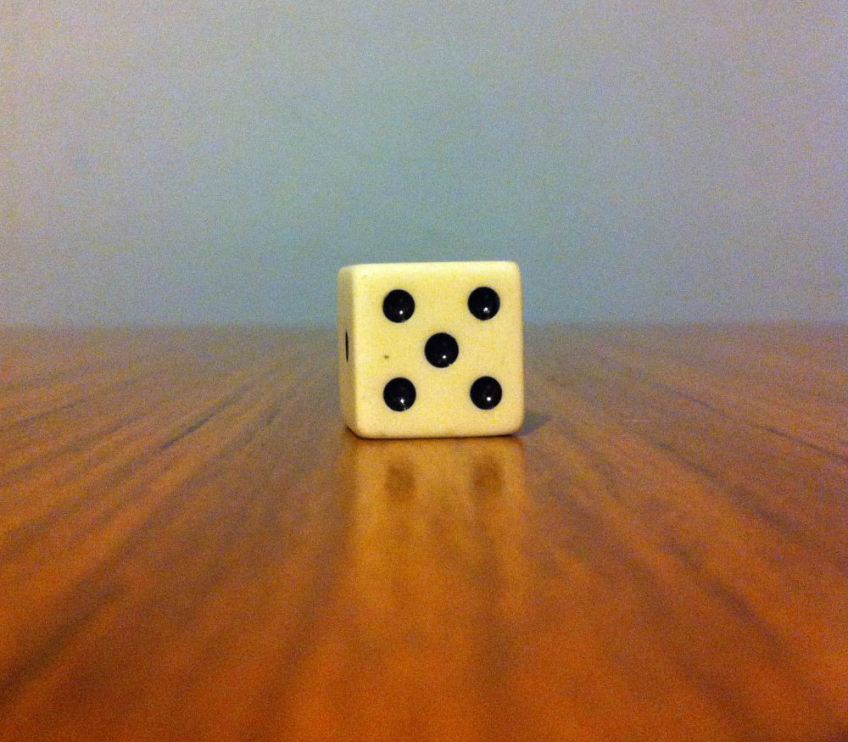 When the die is closer, look at it with just your left eye.