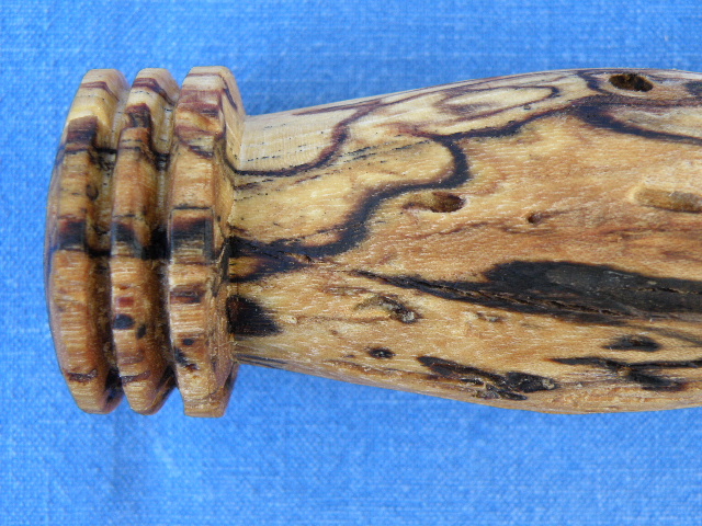 A cannibal fork made of spalted wood.