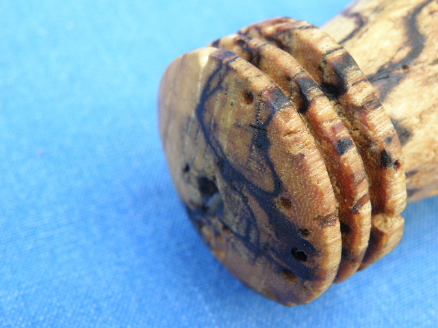 A cannibal fork made of spalted wood.